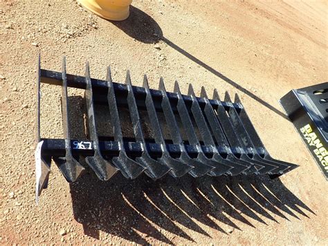 cea root rake for skid steer|custom root rakes for skid steering.